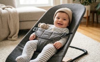 Modern breathable mesh baby bouncer placed inside a sunny nursery.